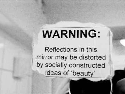warning-reflections-in-mirror